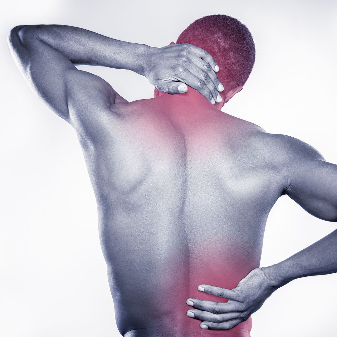 Person grabbing their neck and lower back indicating pain
