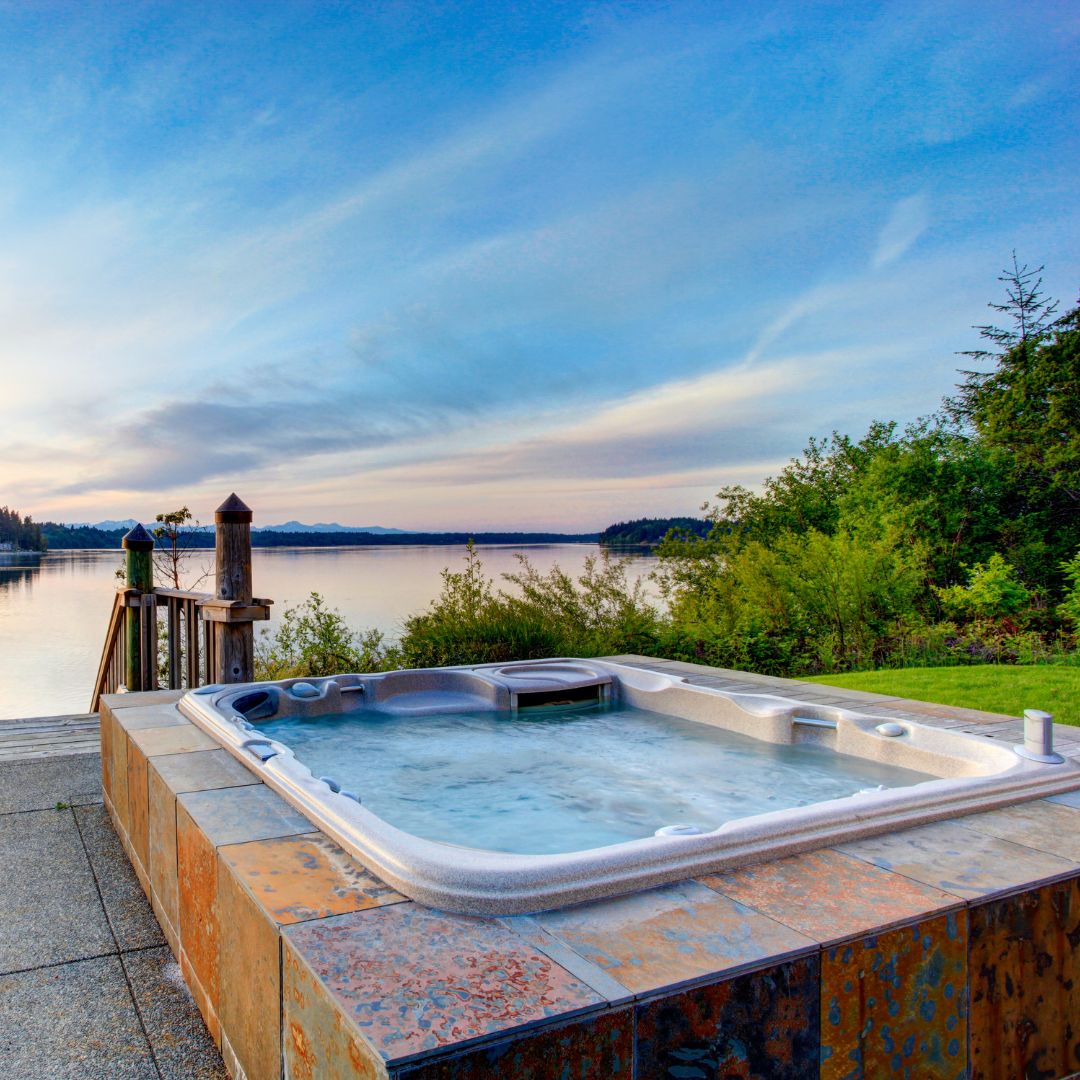 Outdoor hot tub by a lake 